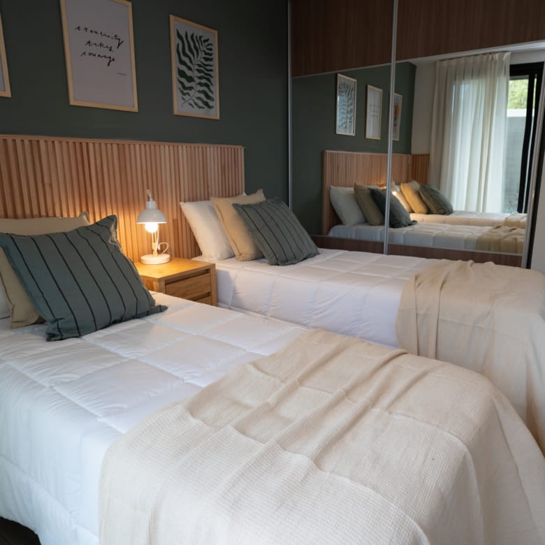 Dormitorio secundario departamento en venta emprendimiento Las Pircas en la ciudad de Alta Gracia, Córdoba.