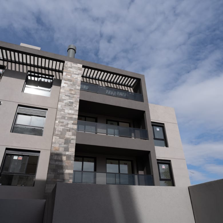 Fachada departamento en venta emprendimiento Las Pircas en la ciudad de Alta Gracia, Córdoba.