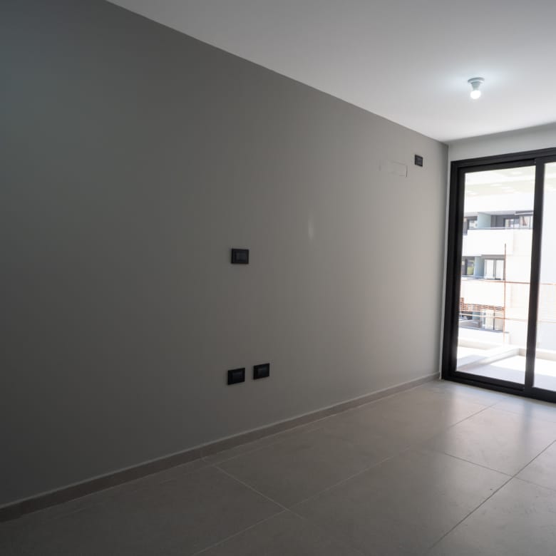 Estar comedor ventanal departamento en venta Distrito Betania Nueva Córdoba